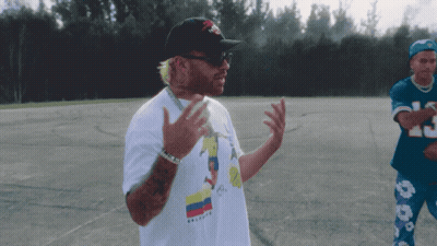 Man in White T-Shirt Saying Colombia