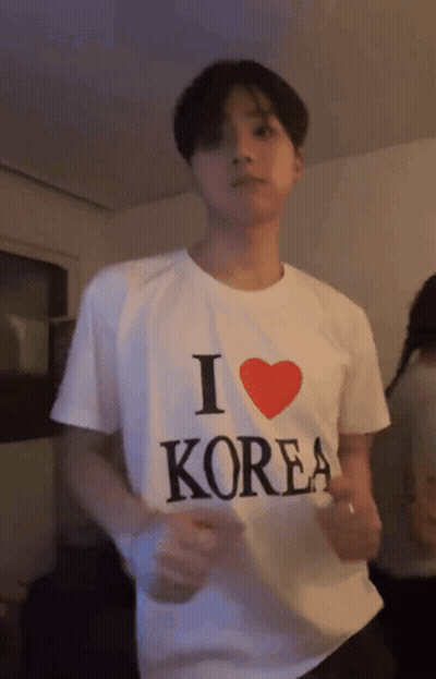 Man In White T-Shirt Saying I Love Korea GIF