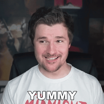 Man In White T-Shirt Saying Yummy GIF