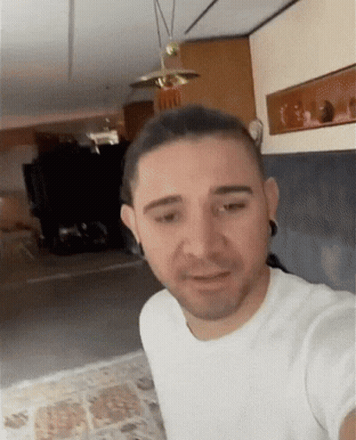 Man In White T-Shirt Taking Selfie GIF