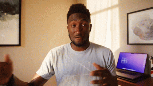 Man In White T-Shirt Using Windows Laptop GIF