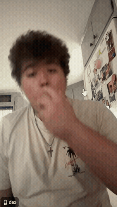 Man In White T-Shirt With Palm Tree Eating GIF