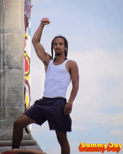 Man In White Tank Top And Black Shorts GIF