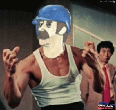 Man In White Tank Top And Blue Baseball Cap GIF