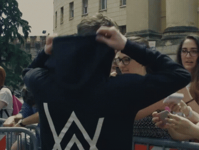 Man In White Tank Top Beside Two Men Dancing GIF