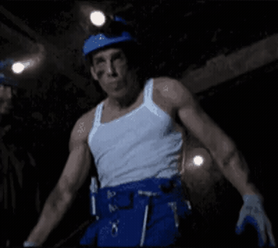 Man In White Tank Top, Blue Pants, Blue Hard Hat GIF