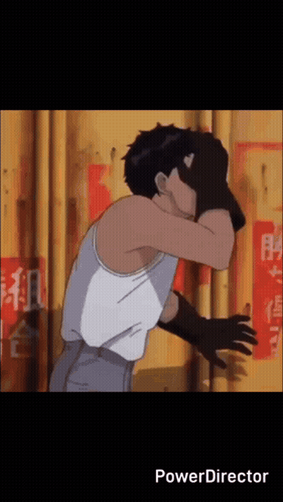 Man In White Tank Top Covering Face With Black Gloves GIF
