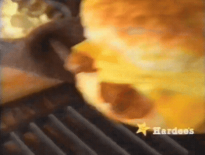 Man In White Tank Top Covering Face With Black Gloves GIF