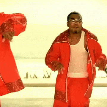 Man In White Tank Top Dancing By Plane With Letter A GIF