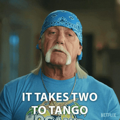Man In White Tank Top Dancing On Pink Background GIF
