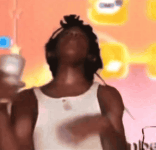 Man In White Tank Top Dancing On Pink GIF