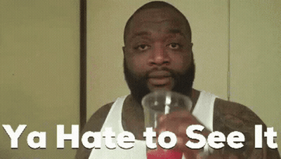 Man In White Tank Top Drinking Juice Saying Ya Hate To See It GIF