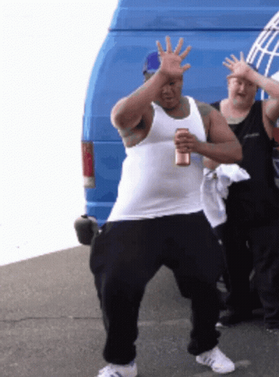 Man In White Tank Top Holding Beer GIF