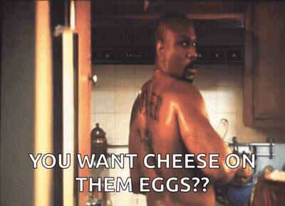 Man In White Tank Top In Hallway GIF