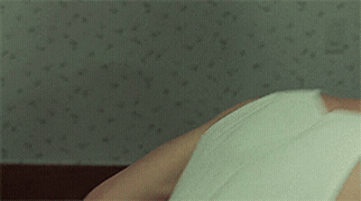Man In White Tank Top Lying Down GIF