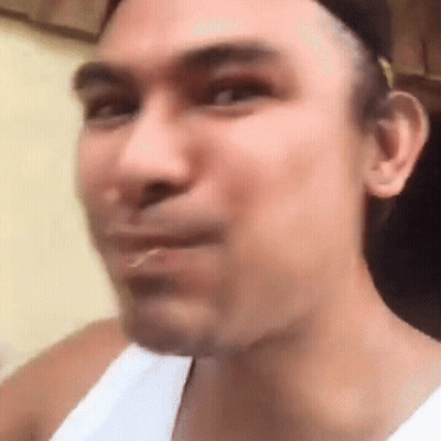 Man In White Tank Top Making Funny Face GIF