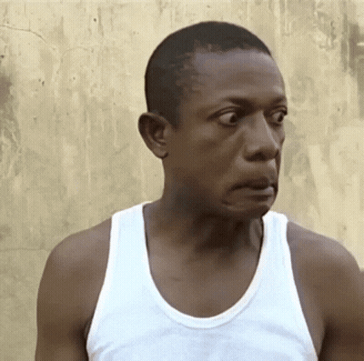 Man In White Tank Top Making Funny Face GIF
