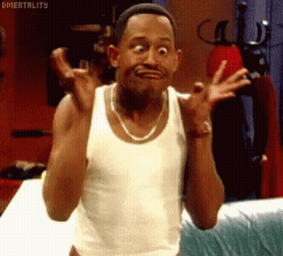 Man In White Tank Top Making Funny Face With Hands Up GIF