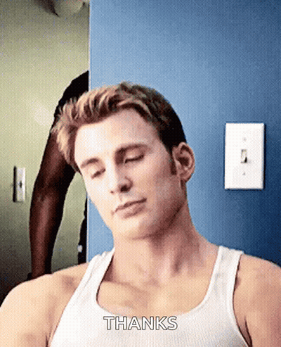 Man In White Tank Top Saying Thanks GIF