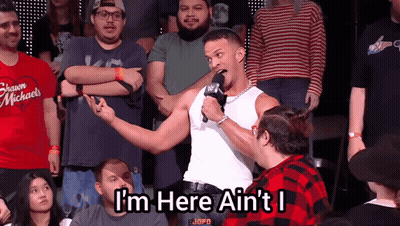 Man In White Tank Top Says I M Here GIF