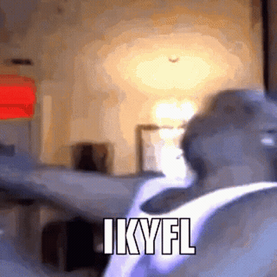 Man In White Tank Top Says Ikyfl Blurry Photo GIF