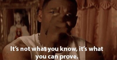 Man In White Tank Top Says It's Not What You Know It's What You Can Prove GIF