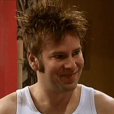 Man In White Tank Top Smiling GIF