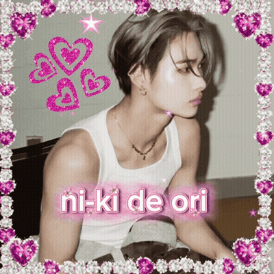 Man In White Tank Top Surrounded By Pink Hearts Says Ni-Ki De Ori GIF