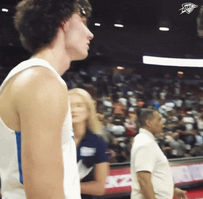 Man In White Tank Top Thunder Logo Crowd GIF