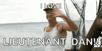 Man In White Tank Top Waving From Boat GIF
