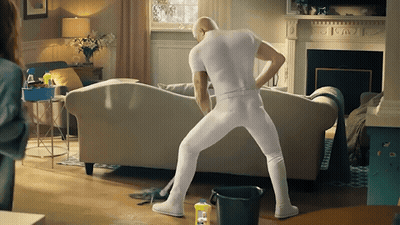Man In White Underwear Standing By Couch GIF