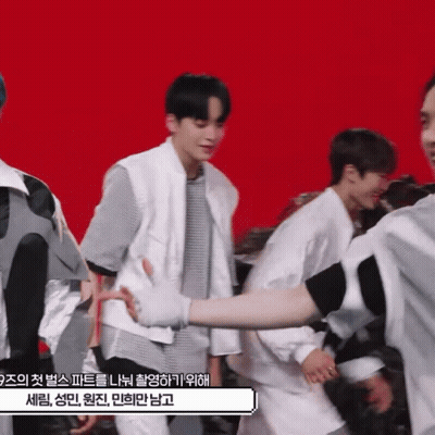 Man In White Vest Holding Arm GIF