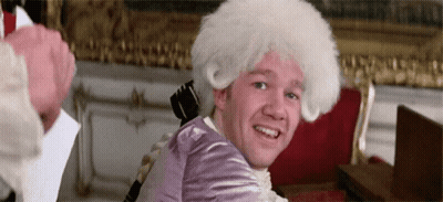 Man In White Wig And Purple Jacket Smiling GIF