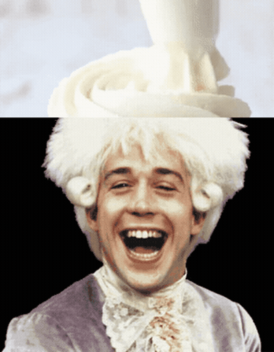 Man In White Wig Laughing With Whipped Cream Swirl GIF