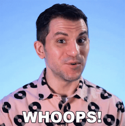 Man In Whoops Shirt Making Funny Face GIF