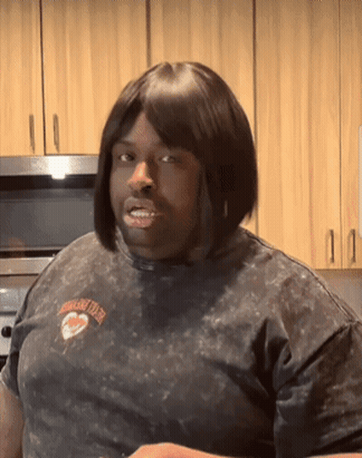 Man In Wig And American Legion T-Shirt GIF