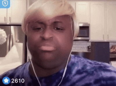 Man In Wig And Earphones Making Funny Face GIF