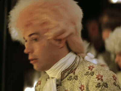 Man In Wig And Floral White Shirt GIF