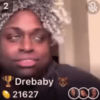 Man In Wig And Hat With Drebaby GIF