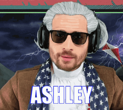 Man In Wig And Headphones With Ashley On Chest GIF