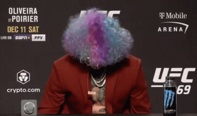 Man In Wig And Sunglasses At T-Mobile Arena GIF