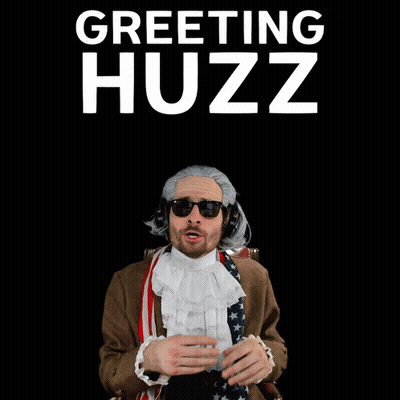 Man in Wig and Sunglasses Greetings Huzz Sign