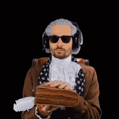 Man In Wig And Sunglasses Holding Book And Feather GIF