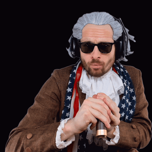 Man In Wig And Sunglasses Holding Cane GIF