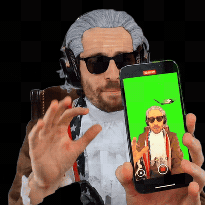 Man In Wig And Sunglasses Holding Cell Phone With Green Screen GIF