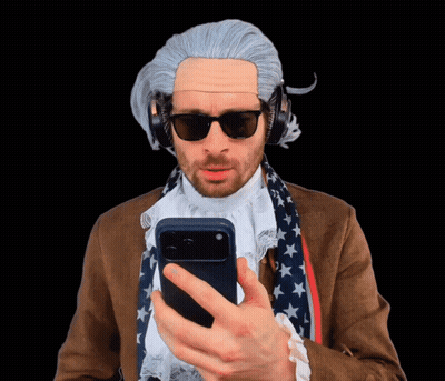 Man in Wig and Sunglasses Looking at Phone