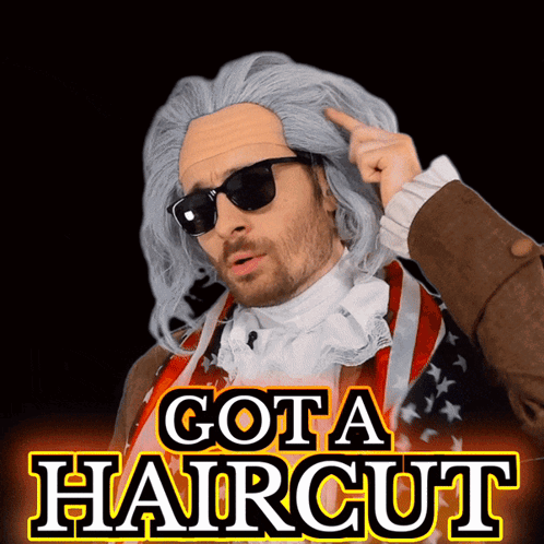 Man In Wig And Sunglasses Pointing At Head With Got A Haircut GIF