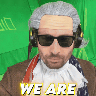 Man In Wig And Sunglasses Saying We Are In GIF