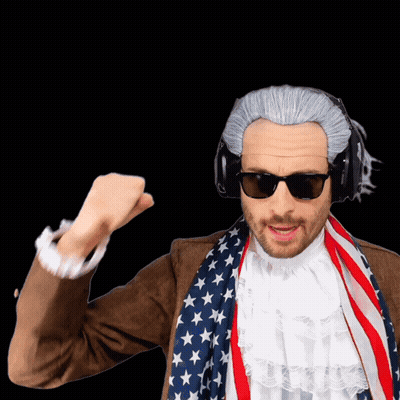 Man In Wig And Sunglasses With American Flag Scarf GIF