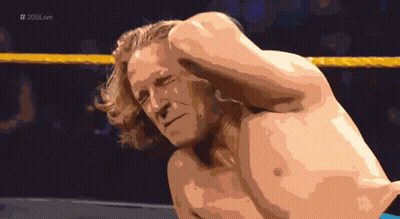 Man In Wig And Sunglasses With Headphones GIF
